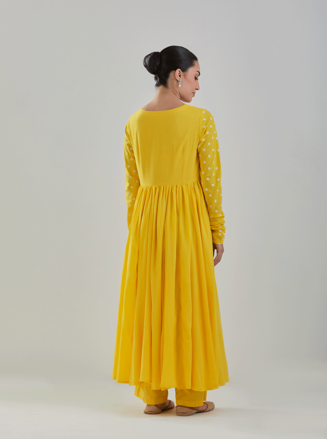 Juanita- Classic yellow gather style anarkali with gather sleeve and polka