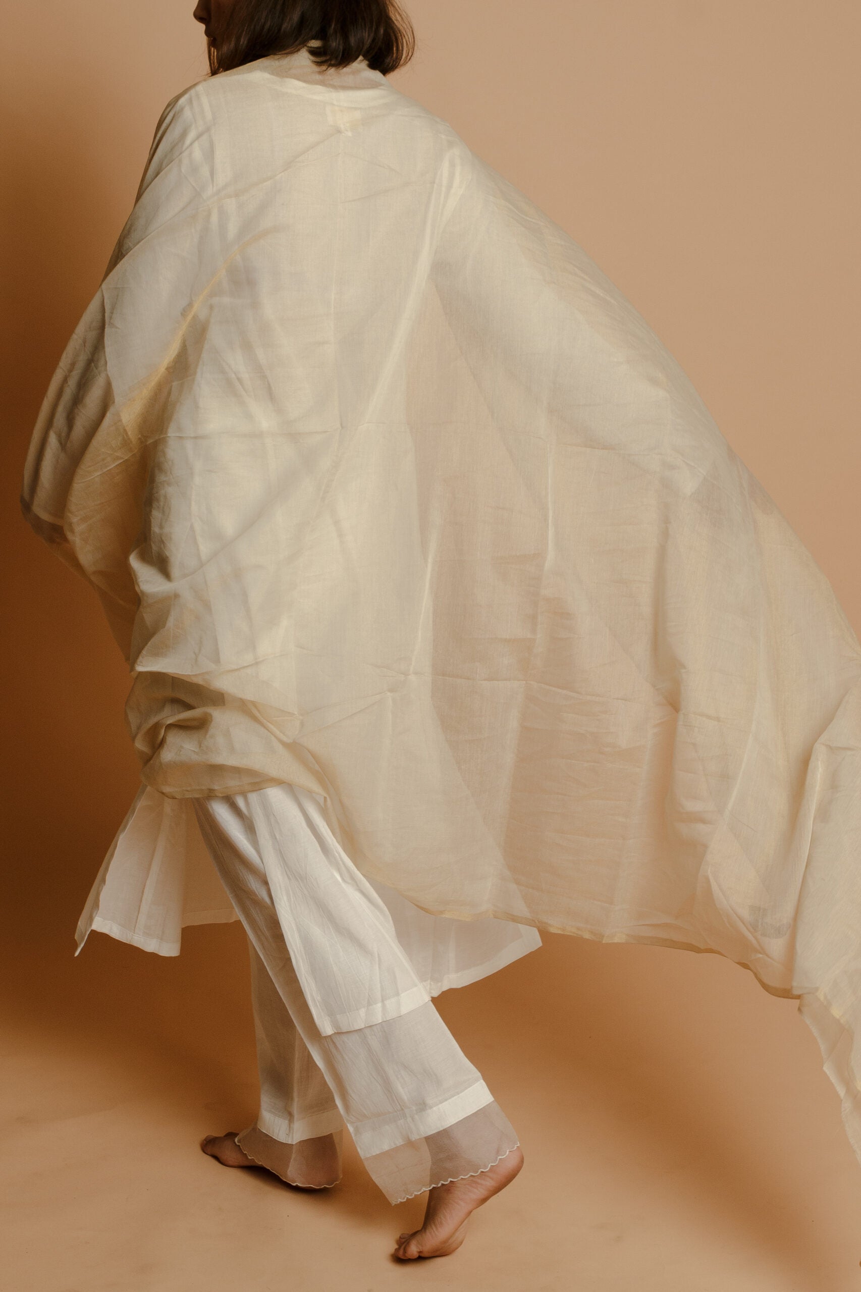 A SERENE OFF-WHITE HANDWOVEN COTTON SILK KURTA