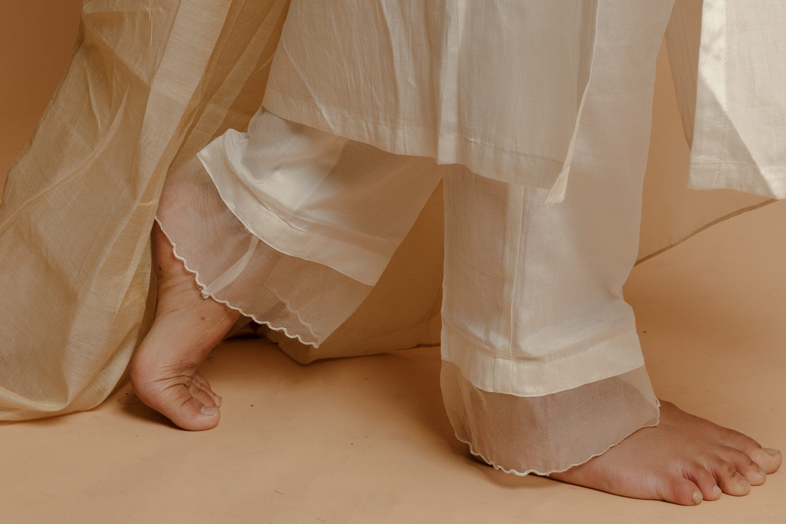 A SERENE OFF-WHITE HANDWOVEN COTTON SILK KURTA