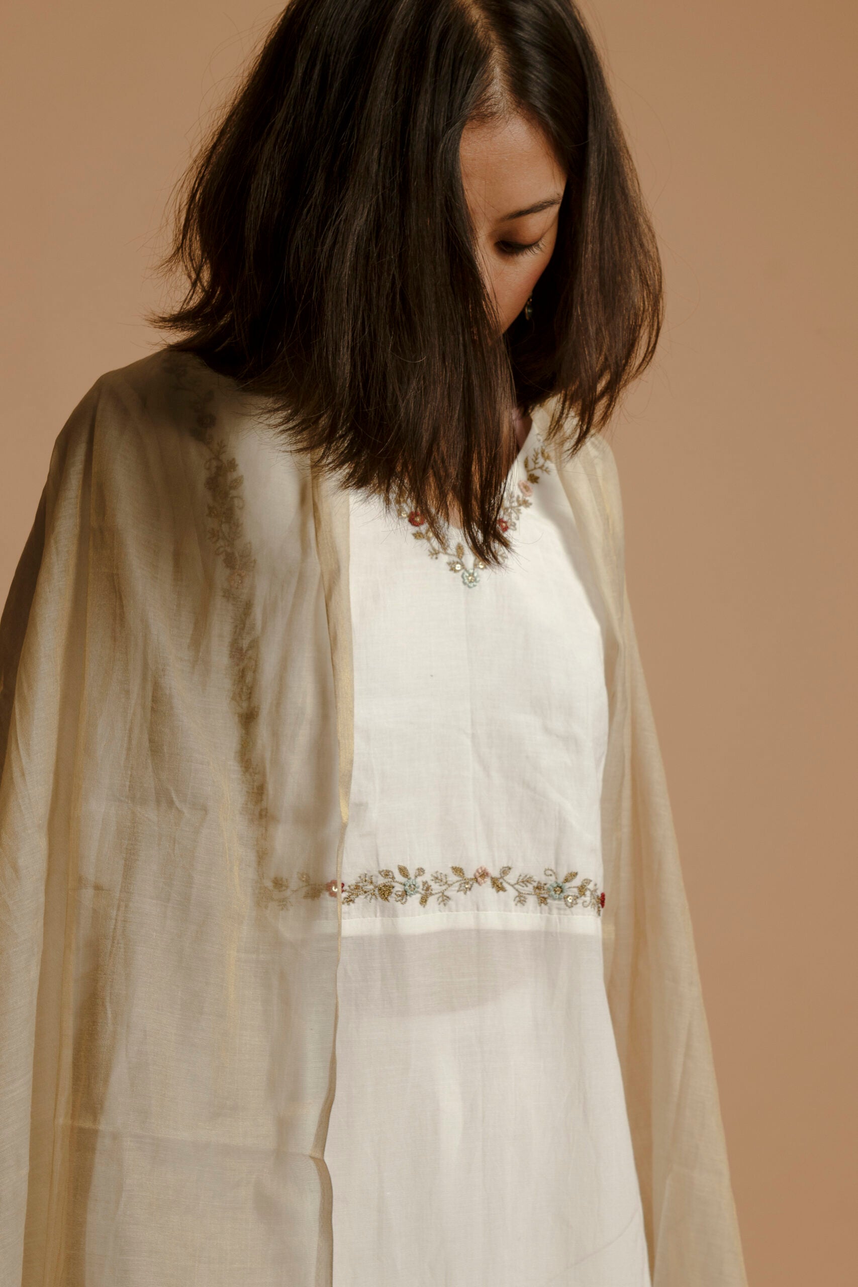 A SERENE OFF-WHITE HANDWOVEN COTTON SILK KURTA