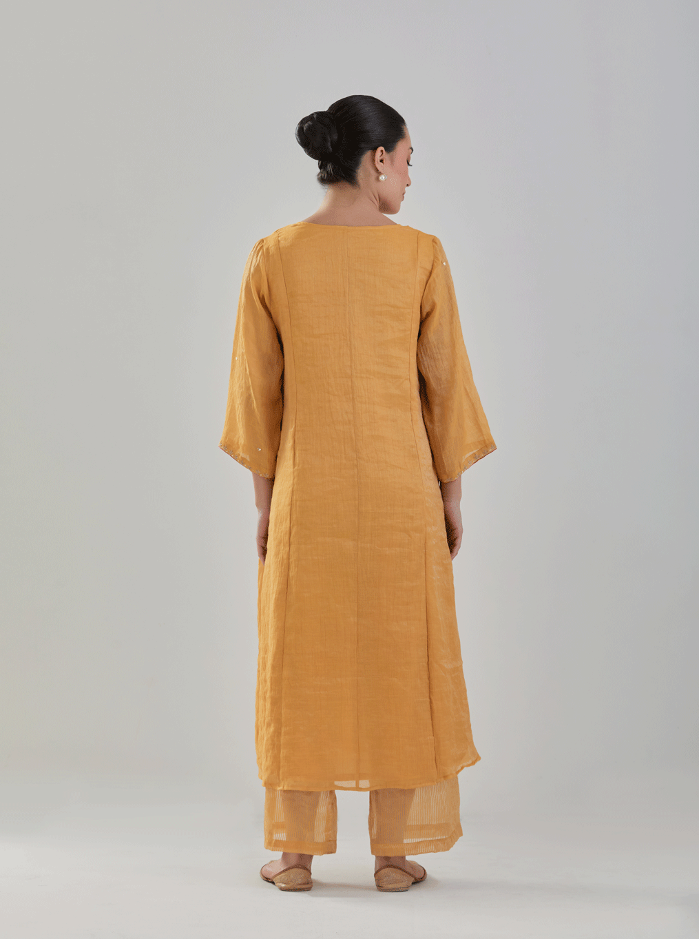 Juanita- Handwoven ochre comfort fit chanderi tissue set with detailing of zari resham