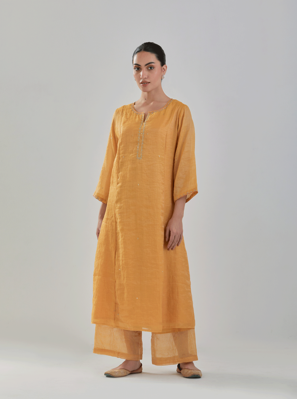 Juanita- Handwoven ochre comfort fit chanderi tissue set with detailing of zari resham