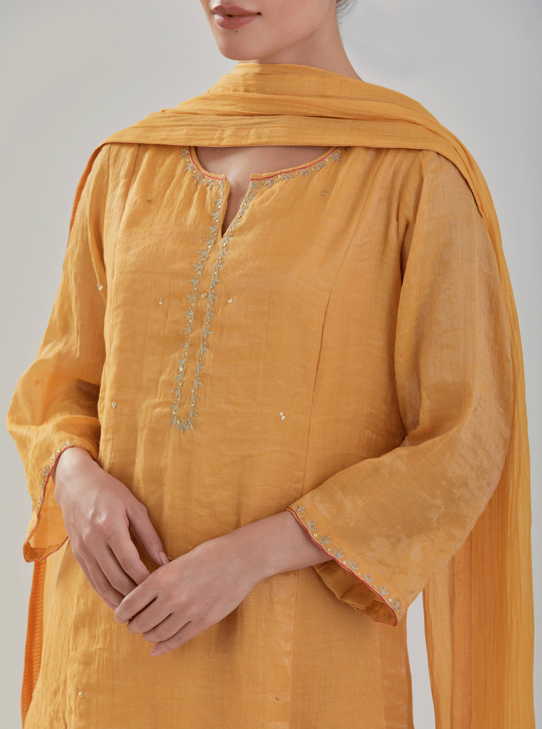 Juanita- Handwoven ochre comfort fit chanderi tissue set with detailing of zari resham