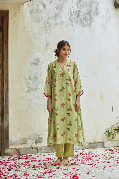 Juanita- Handwoven chanderi pista green comfort fit kurta set with embellishment