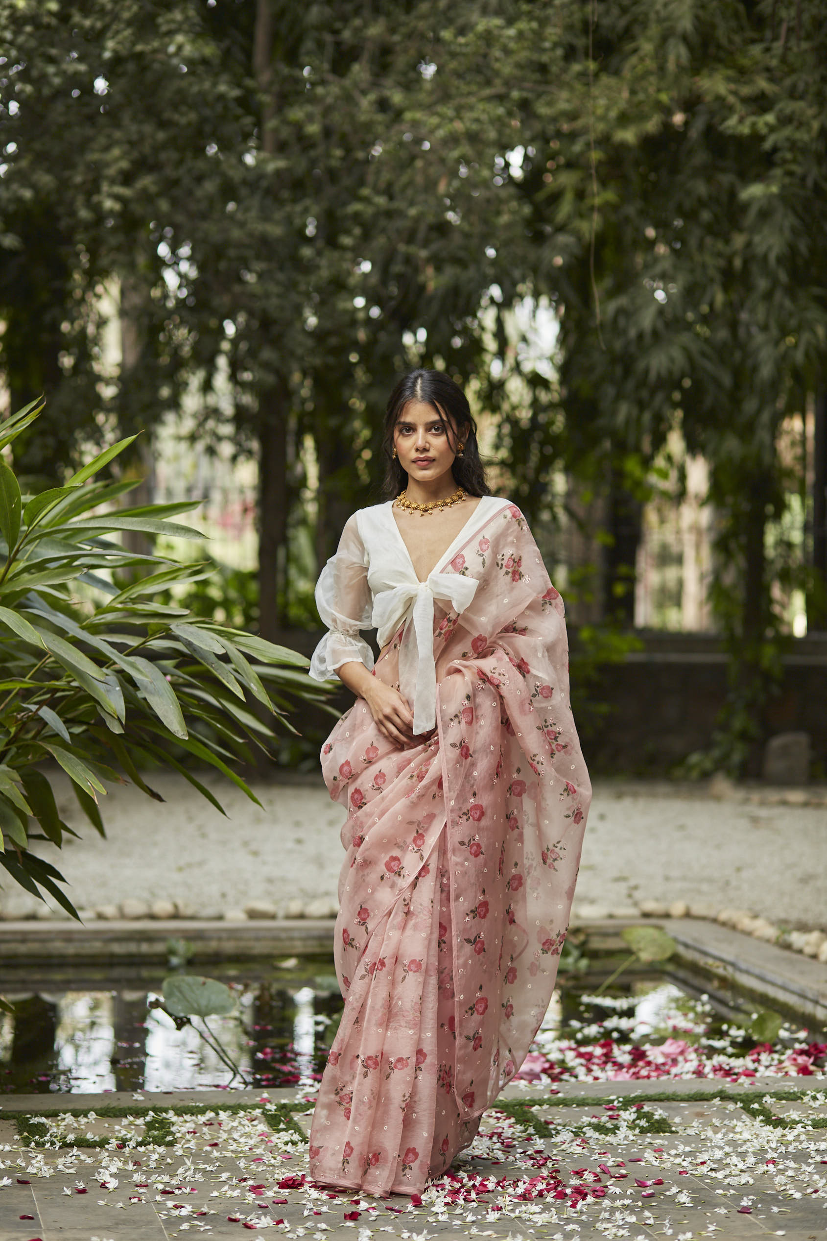 Juanita- Handwoven organza silk saree in persin rose color with embellishment