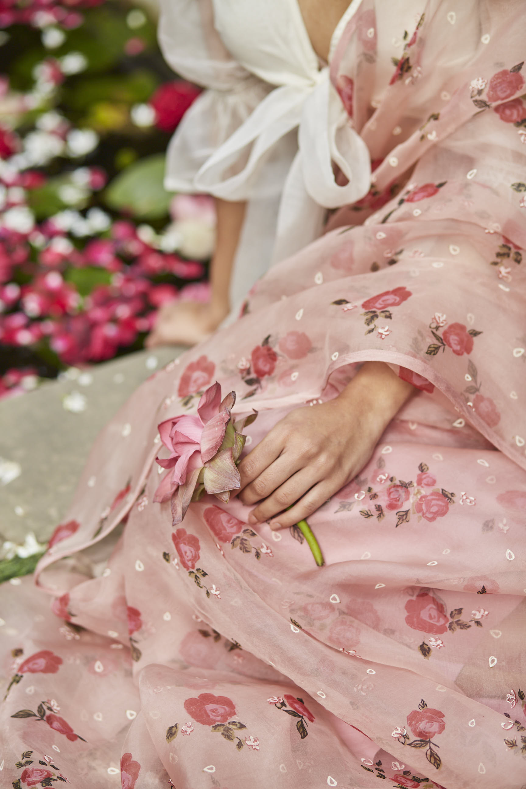 Juanita- Handwoven organza silk saree in persin rose color with embellishment