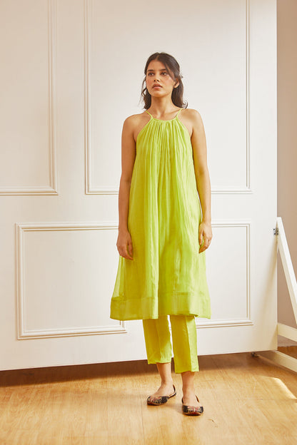 Juanita- Handwoven chanderi sleeveveless tunic dress with front gather paired with cotton trouser in fresh lime color