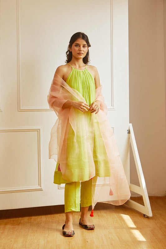 Juanita- Handwoven chanderi sleeveveless tunic dress with front gather paired with cotton trouser in fresh lime color