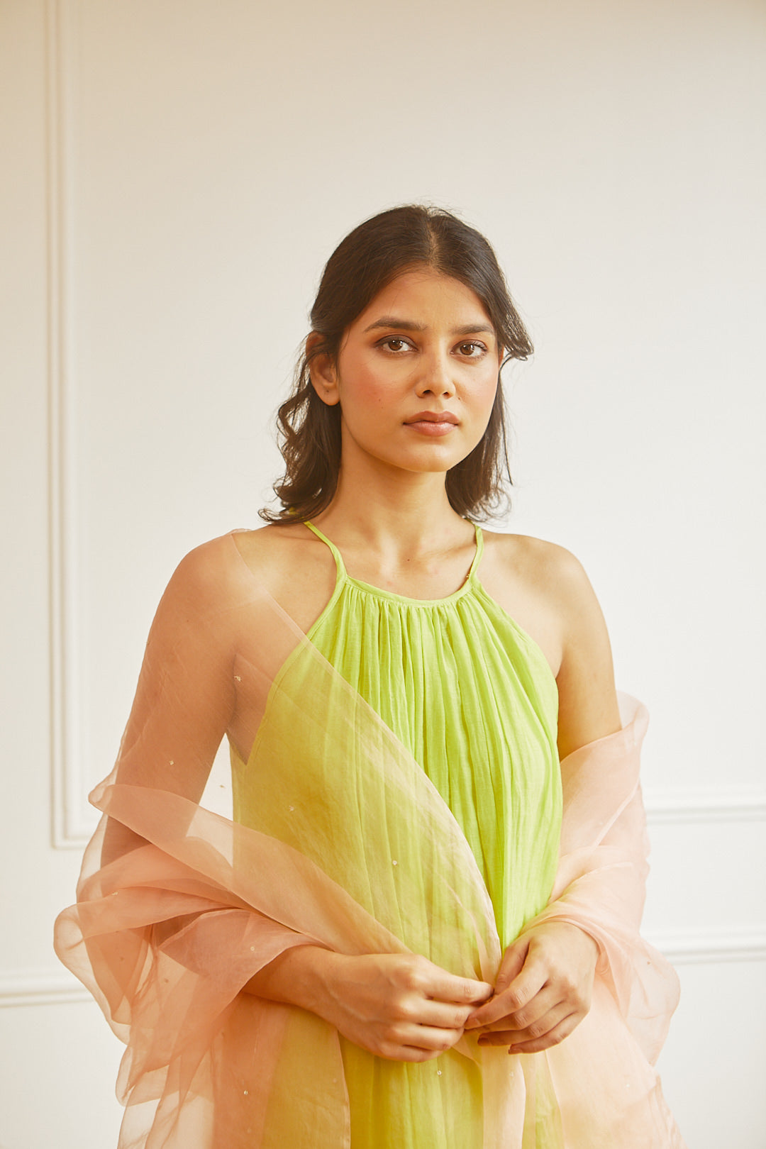Juanita- Handwoven chanderi sleeveveless tunic dress with front gather paired with cotton trouser in fresh lime color