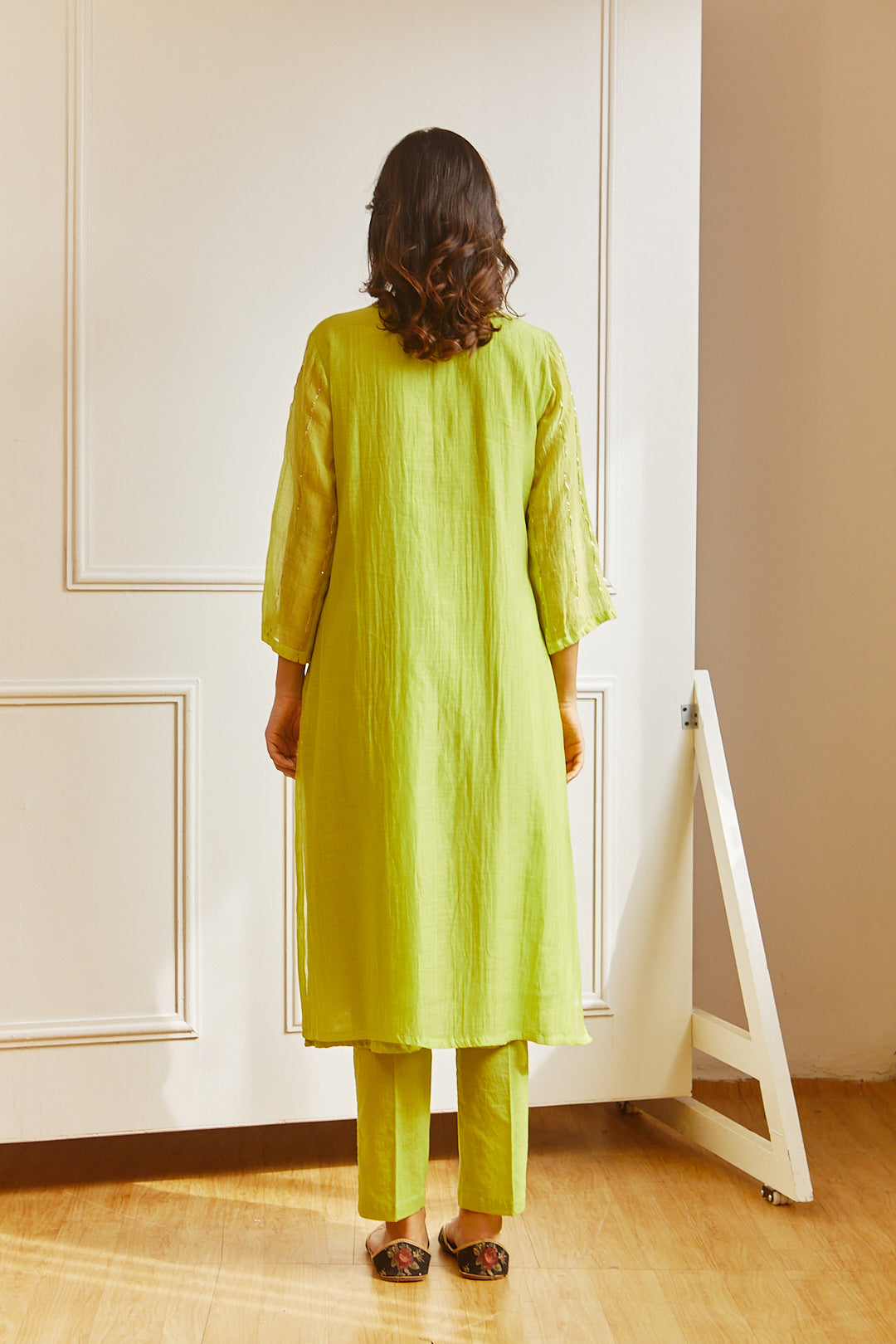 Juanita- Handwoven chanderi comfort fit kurta set in lime green color with embellishment of silver dabka pitta hand embroidery