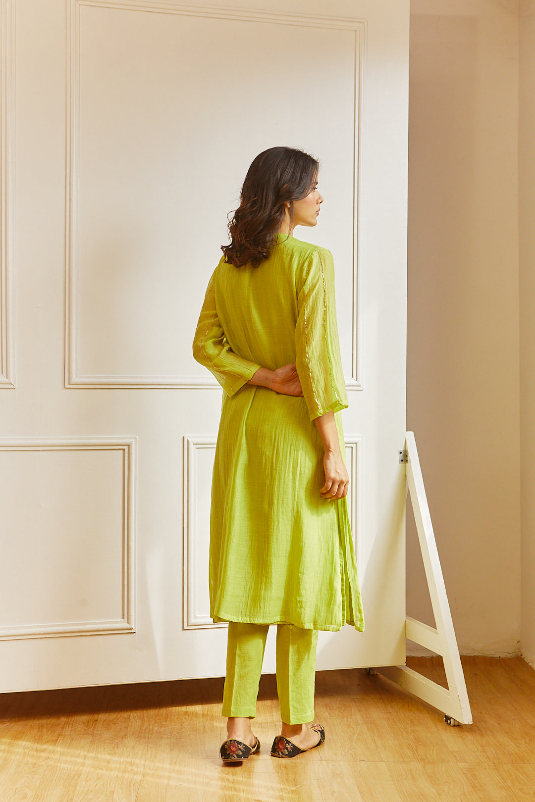 Juanita- Handwoven chanderi comfort fit kurta set in lime green color with embellishment of silver dabka pitta hand embroidery