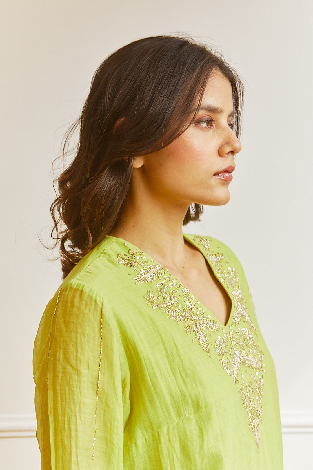 Juanita- Handwoven chanderi comfort fit kurta set in lime green color with embellishment of silver dabka pitta hand embroidery