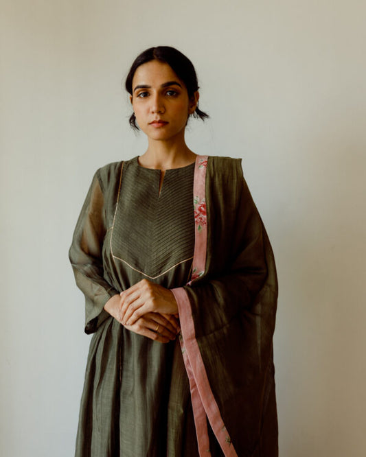 Juanita- Handwoven chanderi comfort fit kurta set in clover green with detailing of pin tuck